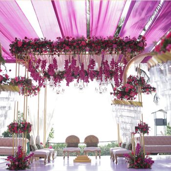 Fuschia blooms, ornate chandeliers and gold elements – this beachside destination wedding in Goa was dreamy!