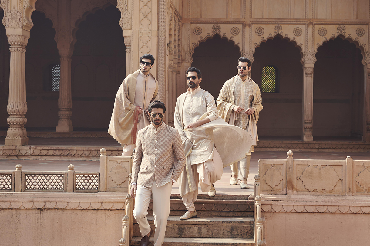 Group of Men Wearing White Traditional Wear