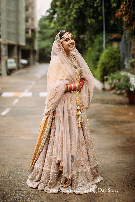 Niti wore a stunning ivory and gold lehenga by Payal Keyal and jewelry by Purab Pashchim