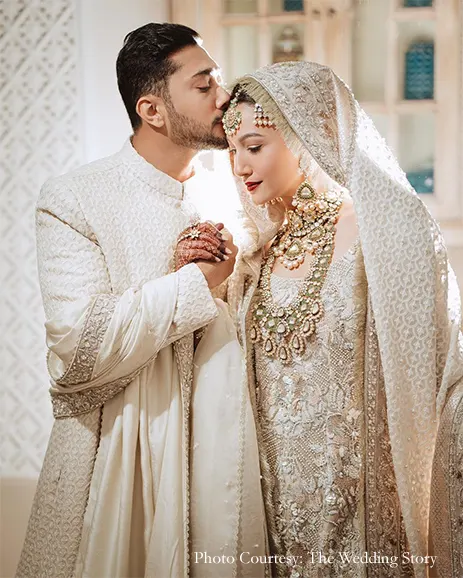 Gauahar Khan and Zaid Darbar wearing white outfits by Laam for the Nikah