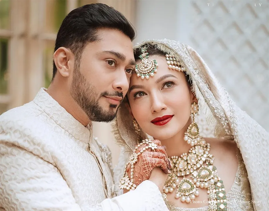 Gauahar Khan and Zaid Darbar wearing white outfits by Laam for the Nikah