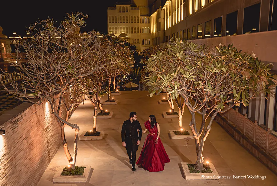 The groom wearing Kunal Rawal creation, while the bride glittered in a red Sulakshana Monga couture gown for the ring ceremony
