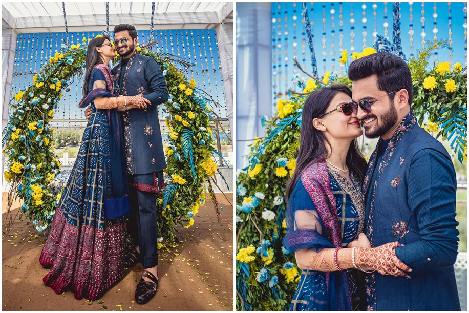 Couple in a navy blue outfit for the bhaat