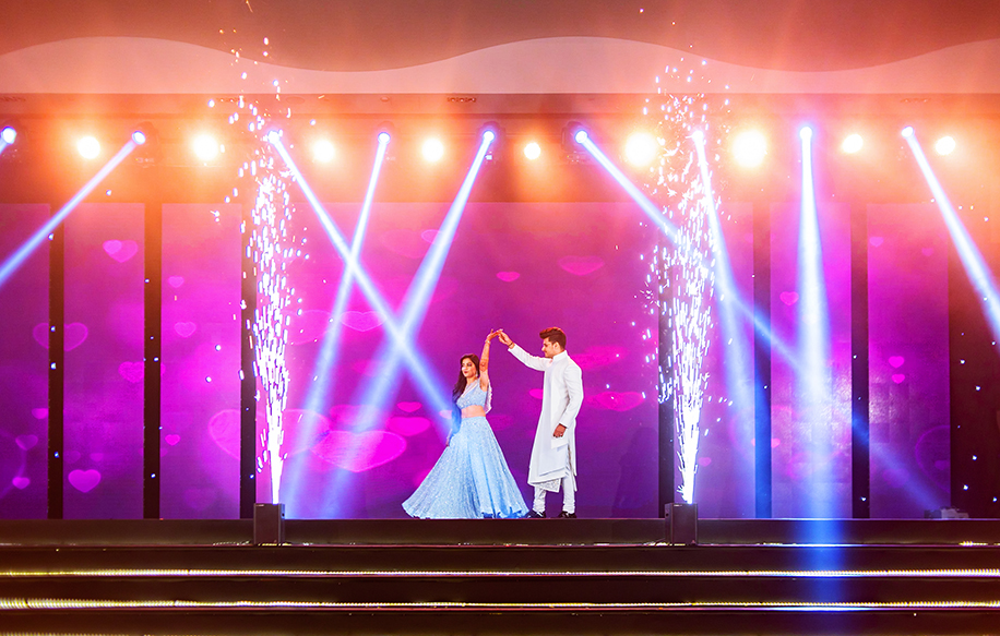 bride-to-be wearing a powder blue lehenga and the groom opted for a white sherwani for sangeet bride-to-be wearing a powder blue lehenga and the groom opted for a white sherwani for sangeet
