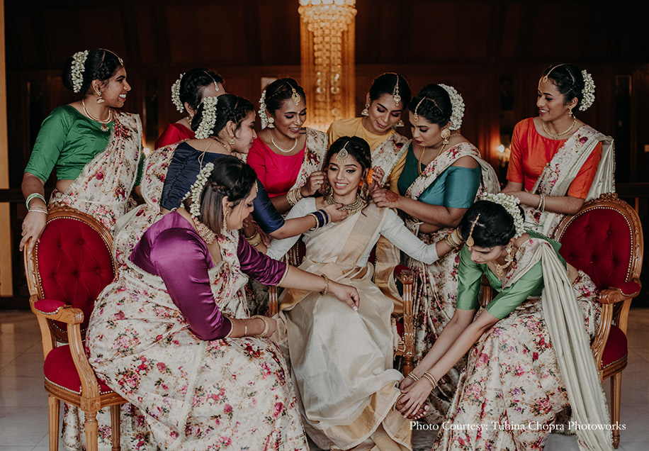 Tamil bride in off-white saree with her bridesmaids