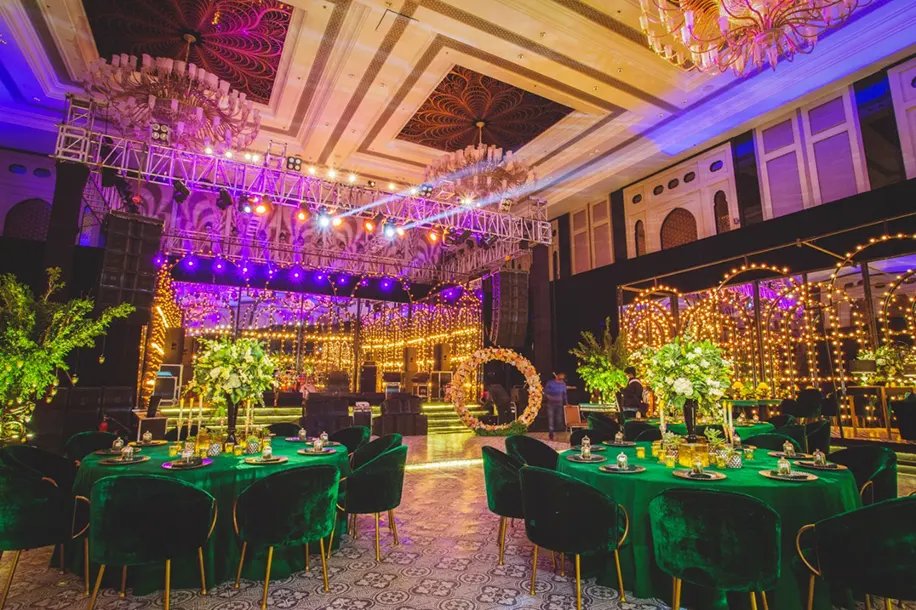 Golden disco balls and flowers welcomed decor for the sangeet