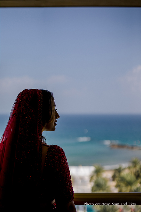Bride in Red Sabyasachi lehenga at Oman