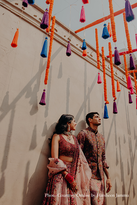 colorful mehendi theme paired with bright orange marigolds