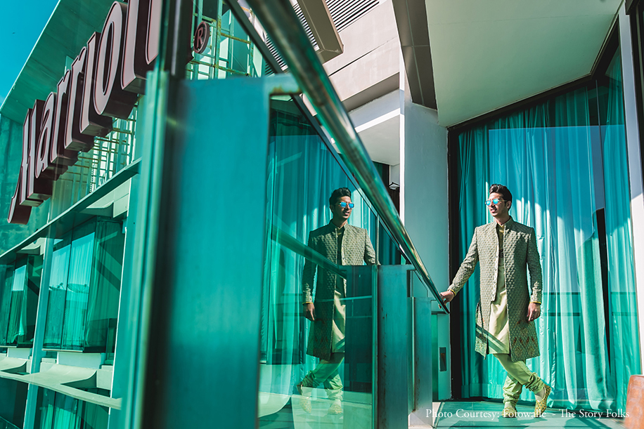 Groom wearing green embroidered sherwani at Anand Karaj Groom wearing green embroidered sherwani at Anand Karaj