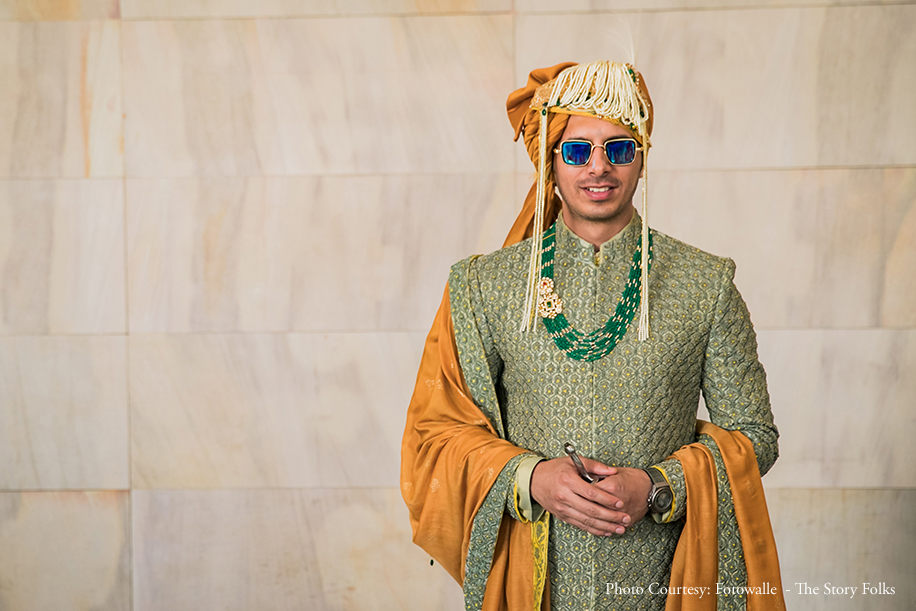 Groom wearing green embroidered sherwani at Anand Karaj Groom wearing green embroidered sherwani at Anand Karaj