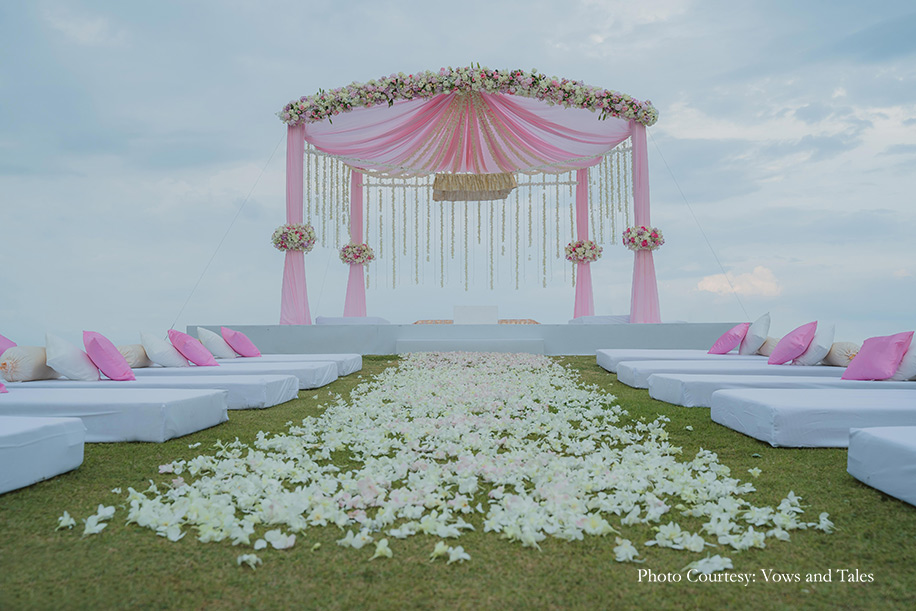 Beachside mandap in pink floral decor at Thailand