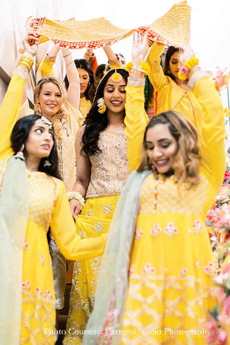 Haldi celebration in yellow outfits