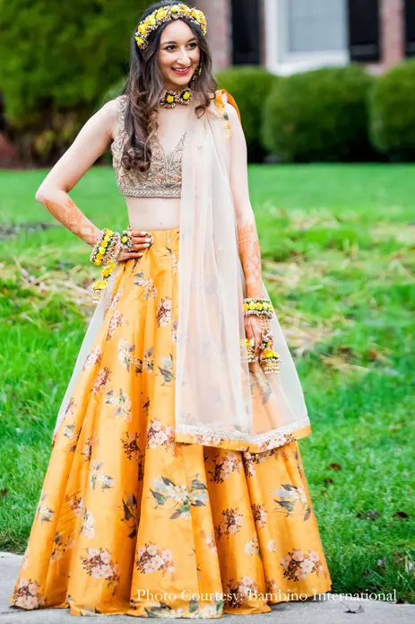 Yellow lehenga and floral jewelry for the haldi