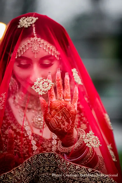 Bride wearing red lehenga