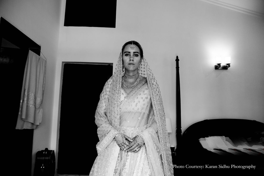 Bride wearing ivory Sabyasachi lehenga for her big day