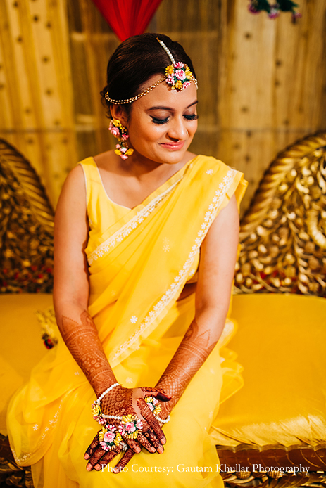 Yellow haldi saree with floral jewelry