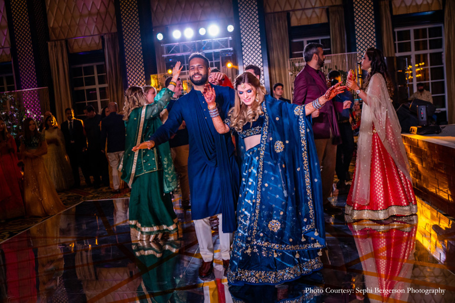 Couple in Blue oufits for Sangeet at ITC Grand Bharat, Gurugram