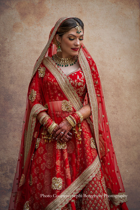 Bride in red lehenga by Sabyasachi at ITC Grand Bharat, Gurugram