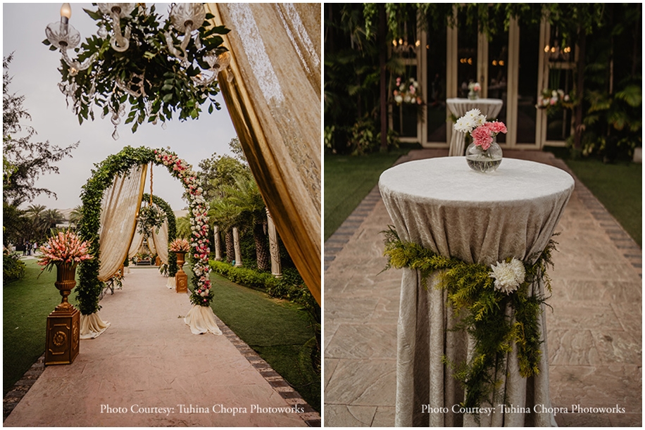 wedding décor of gorgeous blooms and billowing drapes against the lush gardens