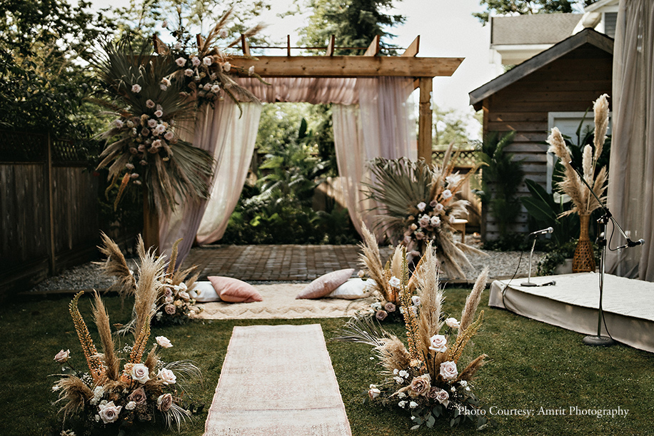 Rustic backyard Indian wedding with Pampas grass mandap decor
