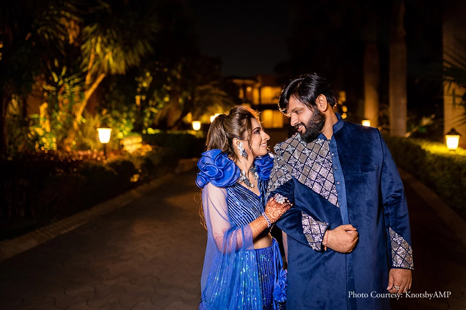 Couple twinning in blue outfits by Tulsi Studio for Sangeet and Engagement