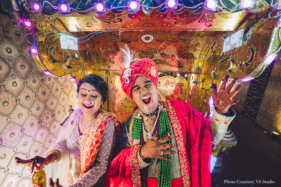 Baraat where the groom entered on a gold chariot decorated with colorful LED lights