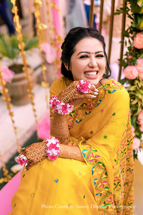 Yellow saree with floral jewelry for haldi