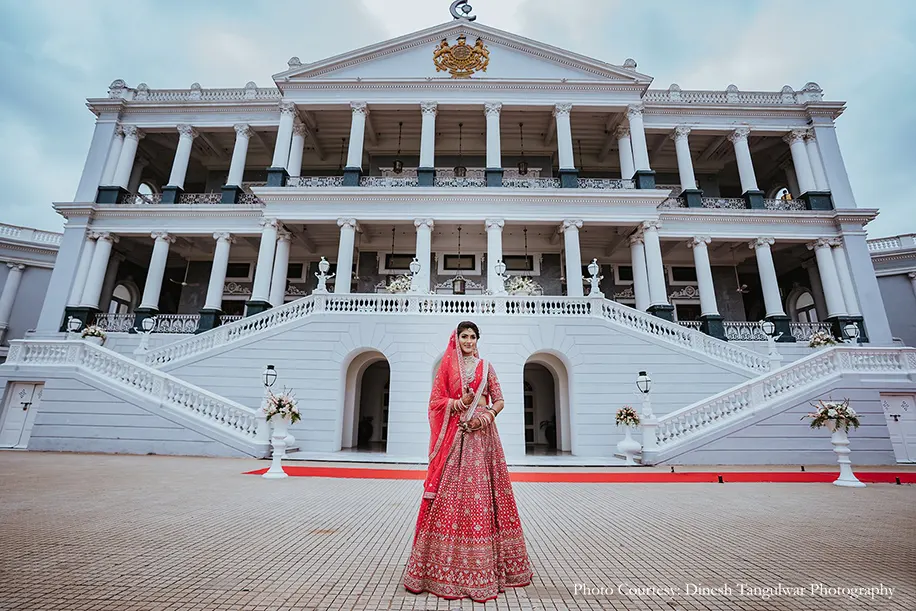 Bride wearing pink lehenga by Anita dongre for the wedding at Taj Falaknuma Palace, Hyderabad