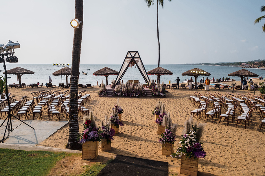 Teepee mandap by the beach Indian wedding terrarium decor minimalist florals.