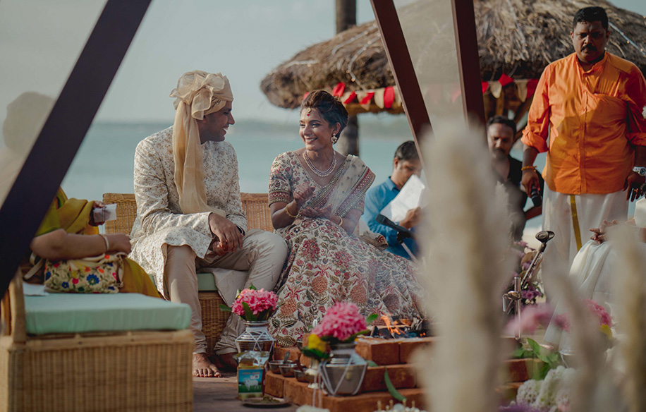 Teepee mandap by the beach Indian wedding terrarium decor minimalist florals.