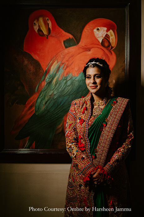 Green saree with red embroidery jacket for cocktail