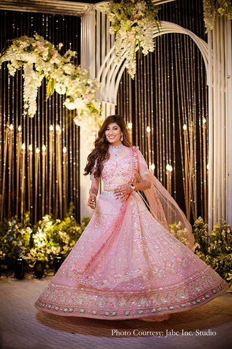 Bride in pink embroidered lehenga
