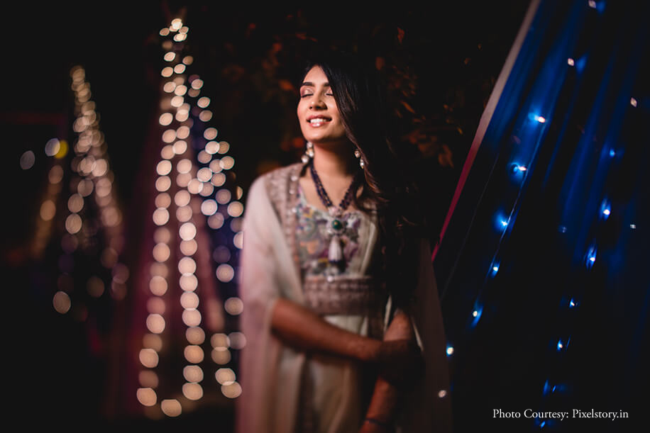 Bride Reception white gown Pooja and Sachin, Udaipur