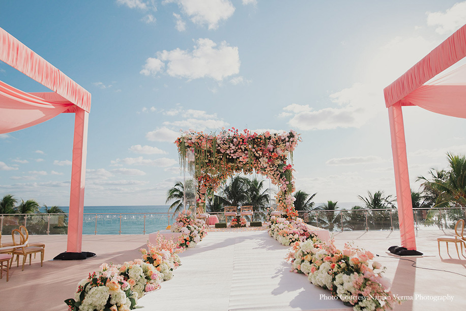 Pink floral beach side mandap decor
