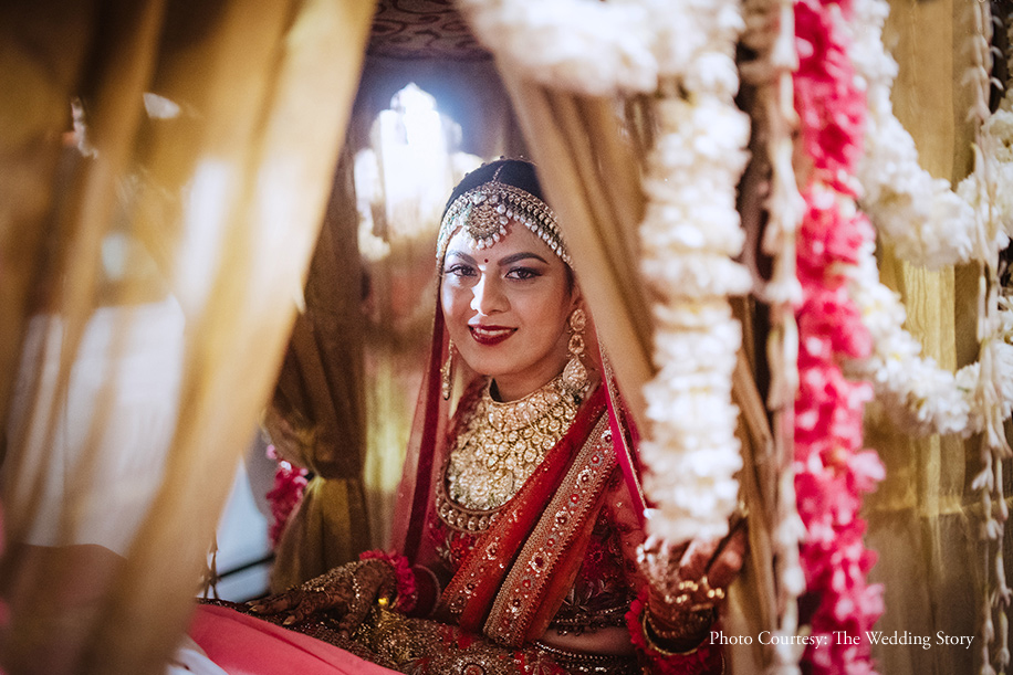 Bride after her vidaai with a traditional royal Palki ride