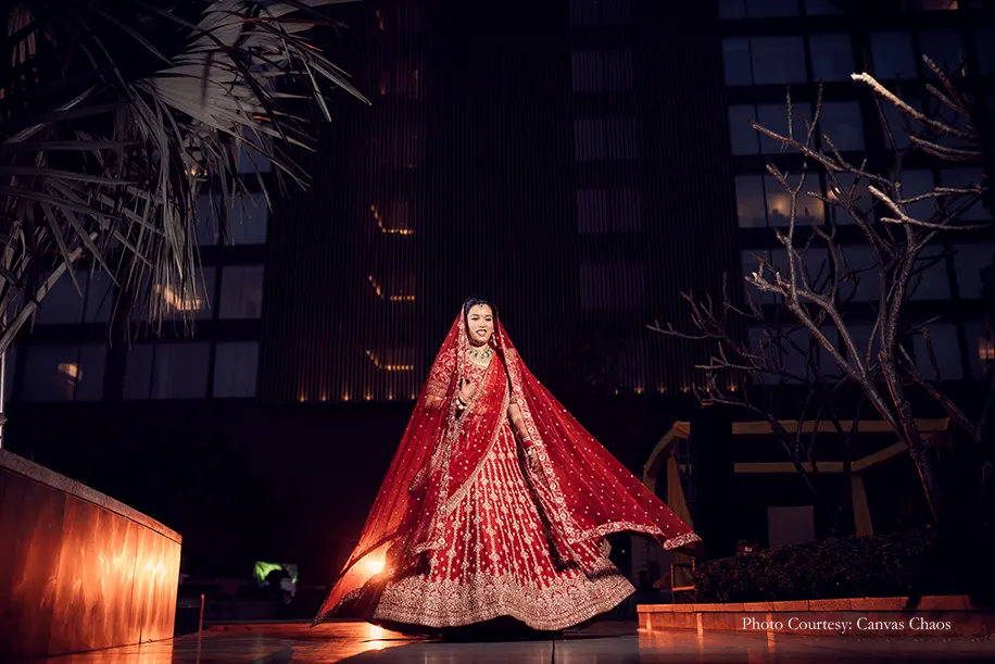 Red lehenga twirl shot