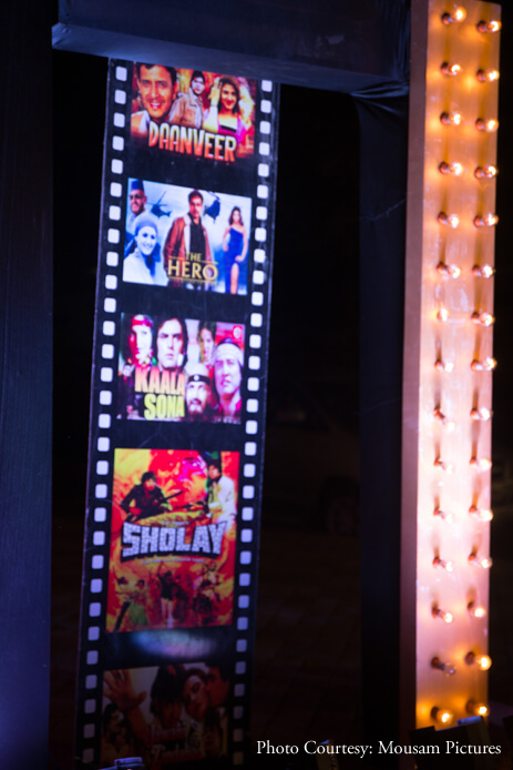 ‘Bollywood’ was the theme for our sangeet and we created a red carpet vibe with lots of yellow bulbs and movie posters