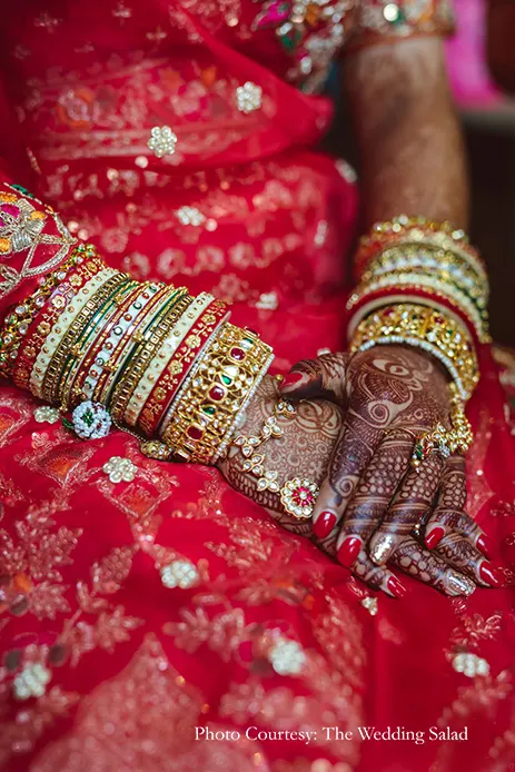 Bride in a traditional bridal red ensemble