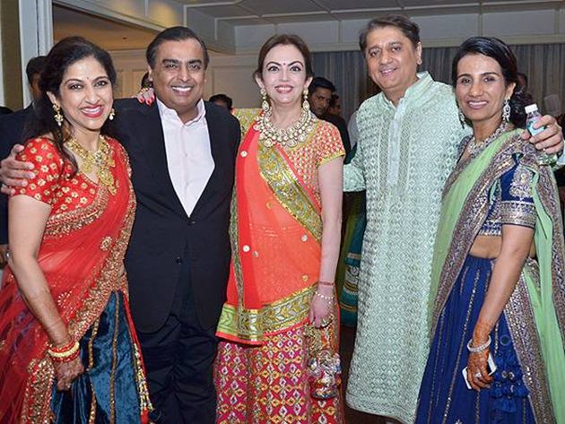 AA The Grooms mother and bride's parents with Nita and Mukesh Ambani