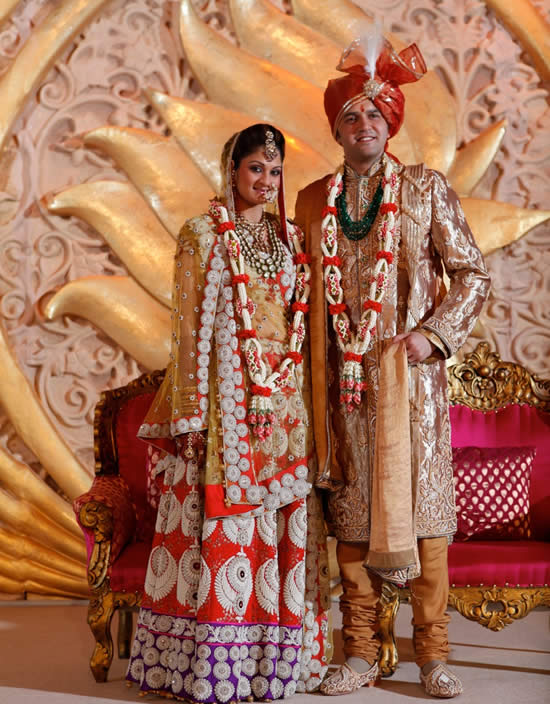 Peacock inspired decor and Gold themed wedding - WeddingSutra