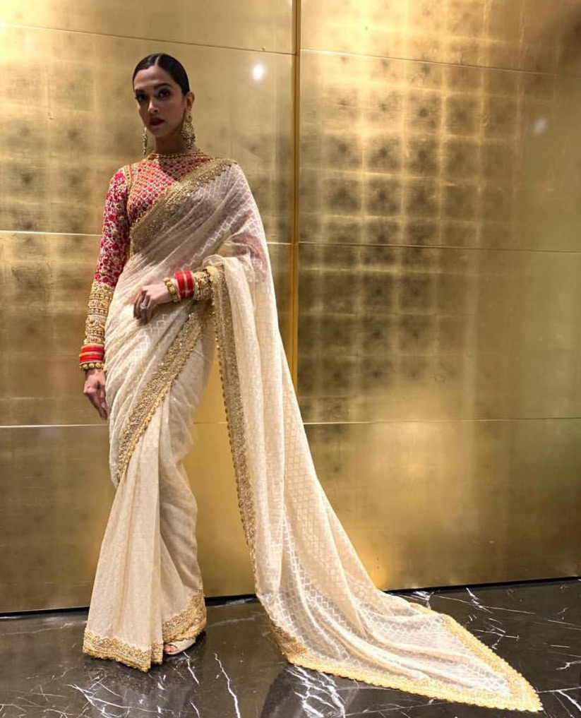 Deepika Padukone in Abu Jani Sandeep Khosla Couture at Isha Ambani and Anand piramal's Wedding