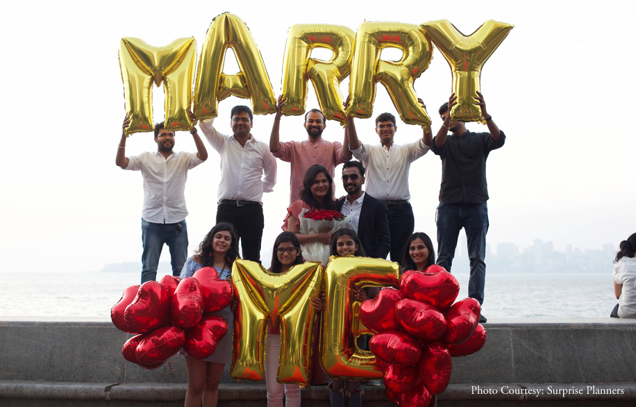A surprise proposal at sunset, on the Marine Drive promenade in Mumbai